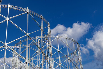 Industrial architecture steel silo metallic skeleton against sky