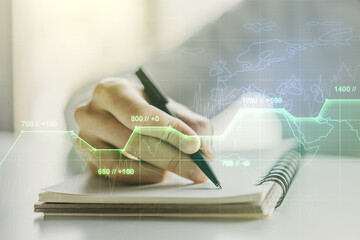 Poster - Multi exposure of stats data illustration with man hand writing in notebook on background, computing and analytics concept