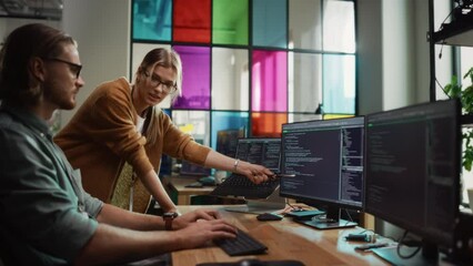 Poster - Male Programmer Shows Progress to Female Start-Up CEO on Desktop Computer in Creative Office Space. Caucasian Man and Woman Discussing New Features For Artificial Inteligence Software.