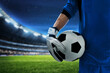 © fotokitas - Soccer goalkeeper holding ball in the stadium