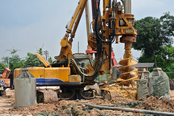 MALACCA, MALAYSIA -MARCH 12, 2015: Bore pile rig machine at the construction site in Malacca, Malaysia. The machine used to driven pile for building foundation work.