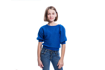 smiling teenage girl in jeans and a blue sweater. positivity and joy. isolated on white background.