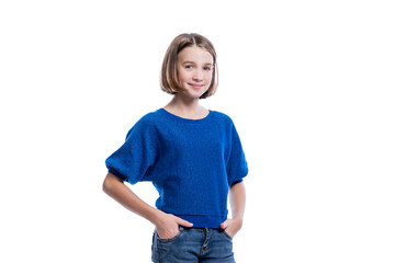 smiling teenage girl in jeans and a blue sweater. positivity and joy. isolated on white background.