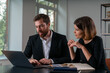 © VideoFlow - Pensive businesswoman and businessman in formal wear working together