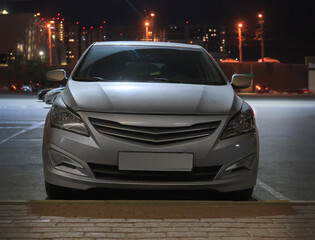 Canvas Print - Car at night in the parking lot in the city