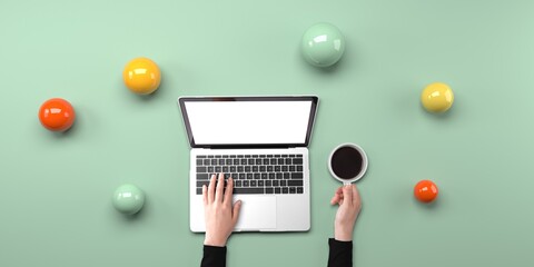 Poster - Person using a laptop computer with abstract spheres from above