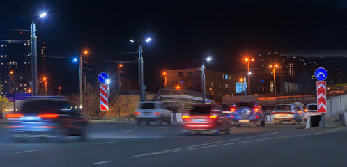 Wall Mural - traffic at night on a street in the city