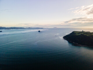 Poster - First light over Cooks Beach, Coromandel Peninsula in New Zealand's North Island