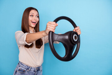 Poster - Low angle view photo of crazy funky lady first car lesson test drive new road look empty space isolated on blue color background