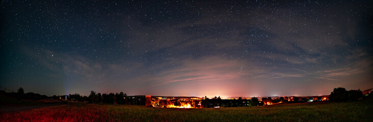 Poster - night city panorama with starry sky