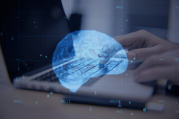Poster - Close up of hands at workplace using laptop computer keyboard with creative blue brain hologram on blurry background. Neurology, anatomy, ai and machine learning concept. Double exposure.