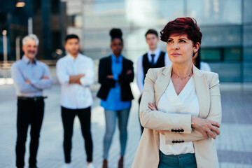 Wall Mural - Elegant businesswoman outdoors