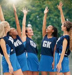 Wall Mural - Netball, sports and motivation with a woman team in celebration after victory in a competitive game on a court. Fitness, collaboration and training with a female athlete winner group at practice