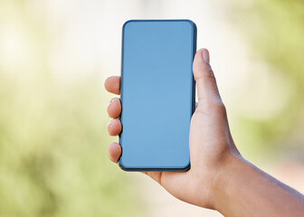 Poster - Smartphone, screen mock up and hand in nature for mobile app, social media or website advertising, marketing or product placement. Holding phone for internet travel mock up, 5g network or ux design