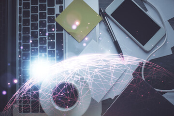 Poster - Social network hologram drawings over computer on the desktop background. Top view. Multi exposure. Concept of people connection.