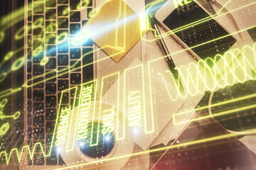 Poster - Education hologram drawings over computer on the desktop background. Top view. Multi exposure.