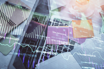 Poster - Multi exposure of financial chart drawing over table background with computer. Concept of research and analysis. Top view.