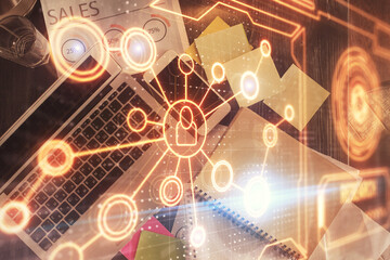 Poster - Social network hologram drawings over computer on the desktop background. Top view. Double exposure.