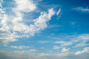 Wall Mural - Background with blue sky and white clouds.