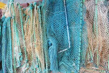 Colorful Mesh Net Fish Trap In A Sea Port