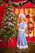 beautiful blonde in New Year's outfit of the Snow Maiden
