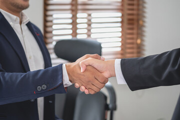 two business men shake hands for business cooperation