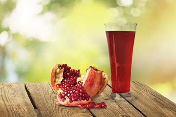 Wall Mural - Tasty sweet ripe pomegranate juice in glass