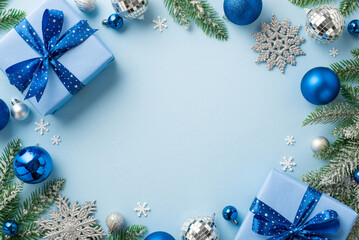 christmas concept. top view photo of blue silver baubles disco balls snowflake ornaments present box