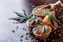 Cupcake With Marijuana.traditional Sponge Cake With Cannabis Weed Cbd. Medical Marijuana Drugs In Food Dessert, Ganja Legalization.