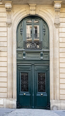 Wall Mural - Paris, an ancient wooden door, beautiful facade in a luxury neighborhood, in the 8e arrondissement
