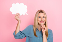 Photo Of Toothy Beaming Positive Woman With Straight Hairdo Wear Blue Blouse Hold Mind Cloud Finger Chin Isolated On Pink Color Background