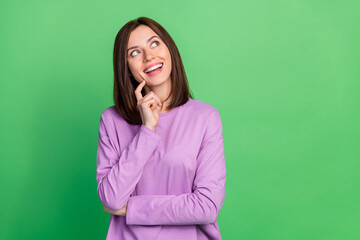 Poster - Photo of inspired excited lady look empty space thinking thoughts isolated on green color background