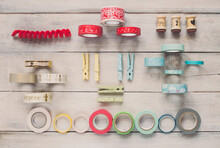 Overhead Flatlay View Of Assorted Craft Supplies Arranged By Colour
