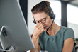 © C D/peopleimages.com - Stress, burnout and call center consultant with a headache while networking for a communications company. Tired, mental health and frustrated telemarketing sales agent with a migraine pain problem