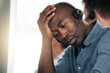 © C D/peopleimages.com - Call center, stress and black man sad about telemarketing depression, problem or work in a crm office. Ecommerce, consulting and African customer service worker thinking of a problem online in sales