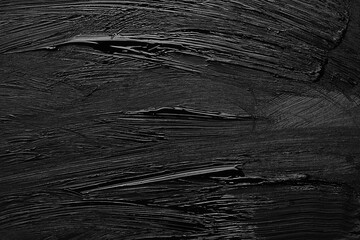 Wall Mural - Beautiful strokes of black paint as background, closeup