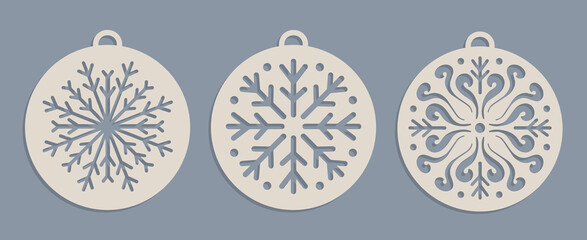 Set of Laser cut Christmas baubles Templates. Christmas tree wood decorations balls with snowflakes