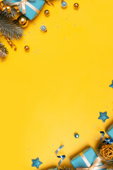 Wall Mural - christmas background with pine tree, gifts and festive decorations top view. christmas flat lay. cop