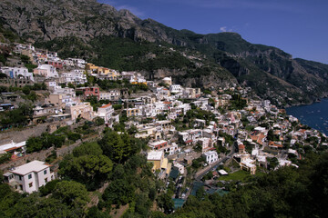 Wall Mural - Panoramic view of beautiful Amalfi Positano on hills leading down to coast, Campania, Neaples, Italy. Amalfi coast is most popular travel and holiday destination in Europe.