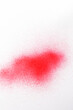 © Curto - a red spray paint stain on a white paper background