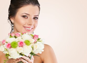 Wall Mural - Beautiful happy wedding woman with bouquet