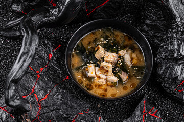 Canvas Print - Asian cuisine. Miso kaeshi in a plate on a black background