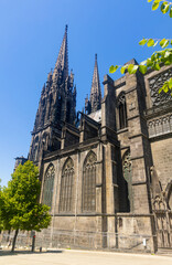 Wall Mural - Towering over Clermont-Ferrand city gothic cathedral Notre-Dame-de-l'Assomption building from black lava, France