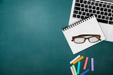 Wall Mural - Glasses, books and notebooks on office or school desk