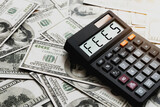 Fototapeta  - Calculator with the word FEES on the calculator placed on the dollar, concepts, fees, fees services and taxes.