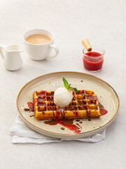 Wall Mural - Portion of sweet belgian waffles with ice cream and jam