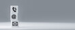 © Celt Studio - Website and Internet contact us page concept with phone, email, mail icons. symbol telephone, mail, address. Website page contact us. web banner, copy space, grey background