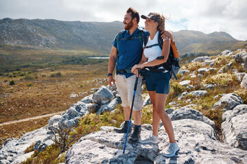 Wall Mural - Health, hiking and couple on mountain range for workout, balance and stick to enjoy nature, wellness and relax. Man, woman and hike for bonding, loving and enjoy natural view for health or fitness.