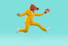 Full Body Side View Strange Excited Man In Yellow Suit And Funny Carnival Horse Mask Holding Gift Present Box, Hurrying To Party, Running, Jumping On Trampoline, Flying High On Blue Studio Background