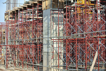 Wall Mural - JOHOR, MALAYSIA -APRIL 13, 2016: Scaffolding used as the temporary structure to support platform, form work and structure at the construction site. Also used it as a walking platform for workers. 
